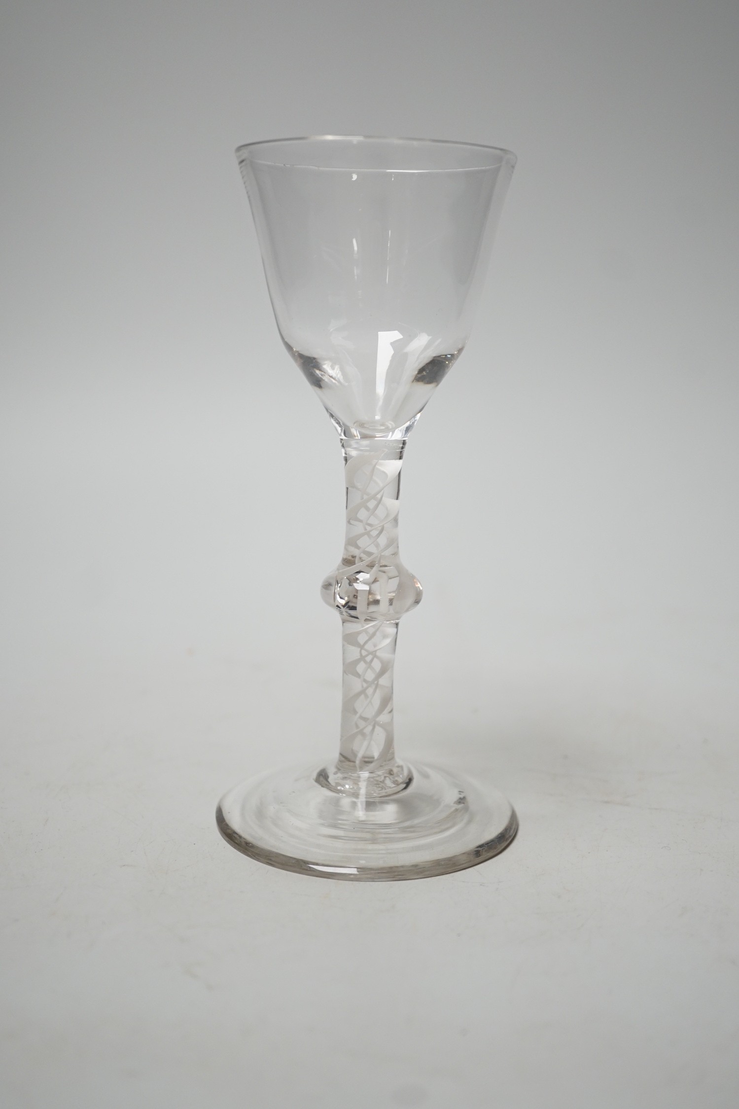 Mid 18th century opaque-twist stem wine glass. 16cm tall
